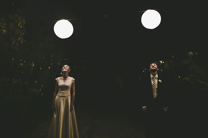 Bride and groom under lantern in Lorne wedding
