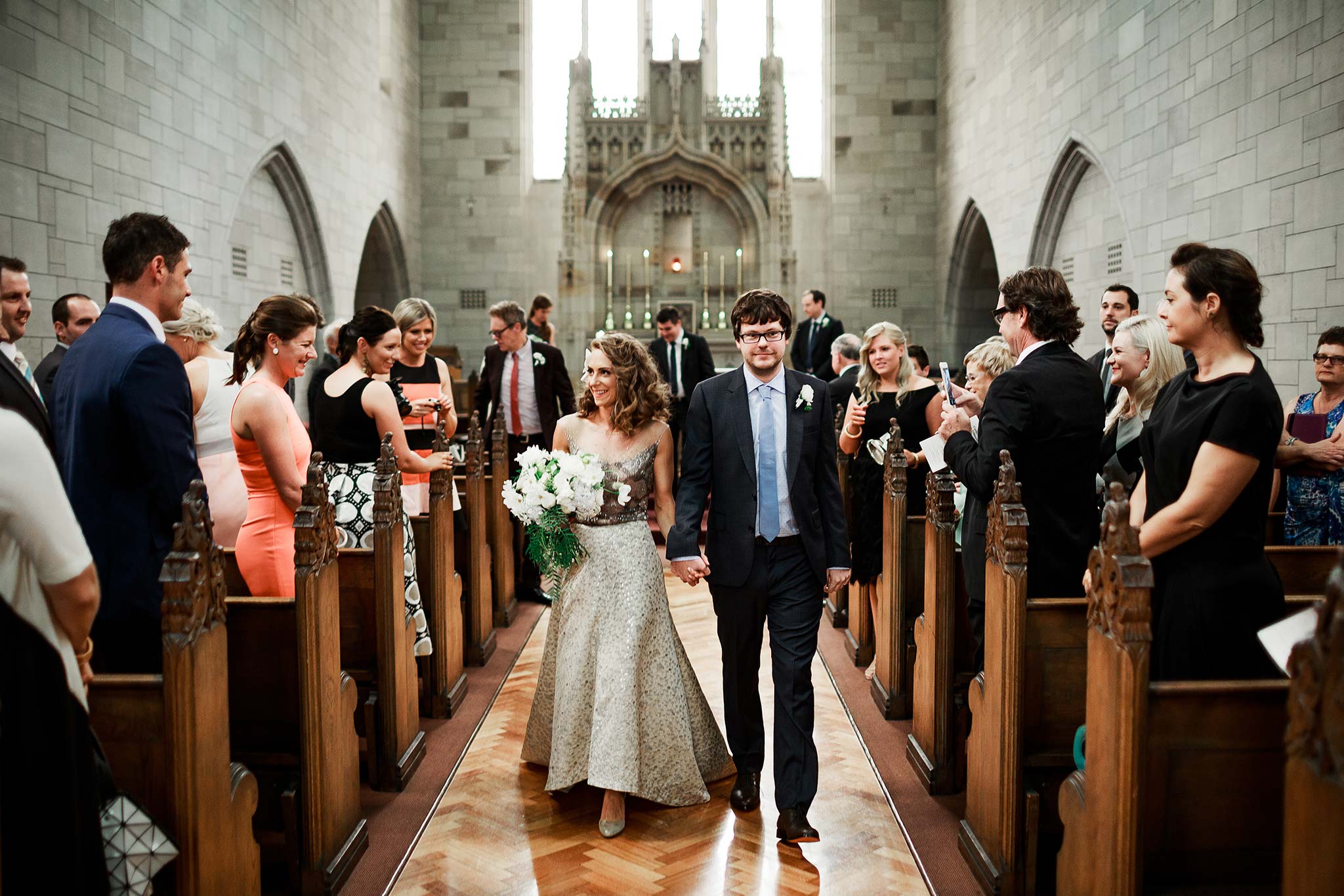 Newman-college-wedding-photographer-ceremony-exit