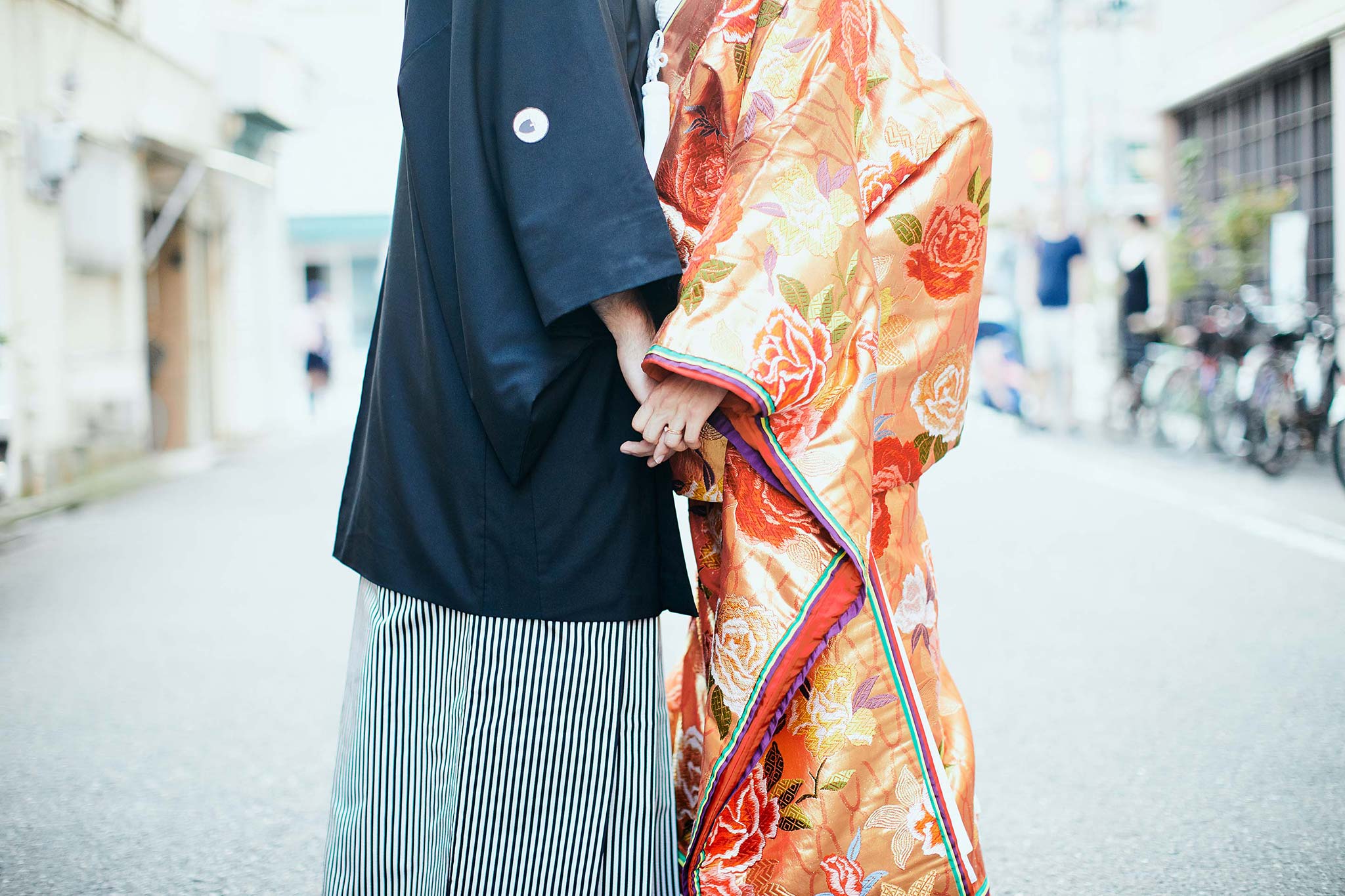 tokyo asakusa shrine traditional wedding couple holding hands