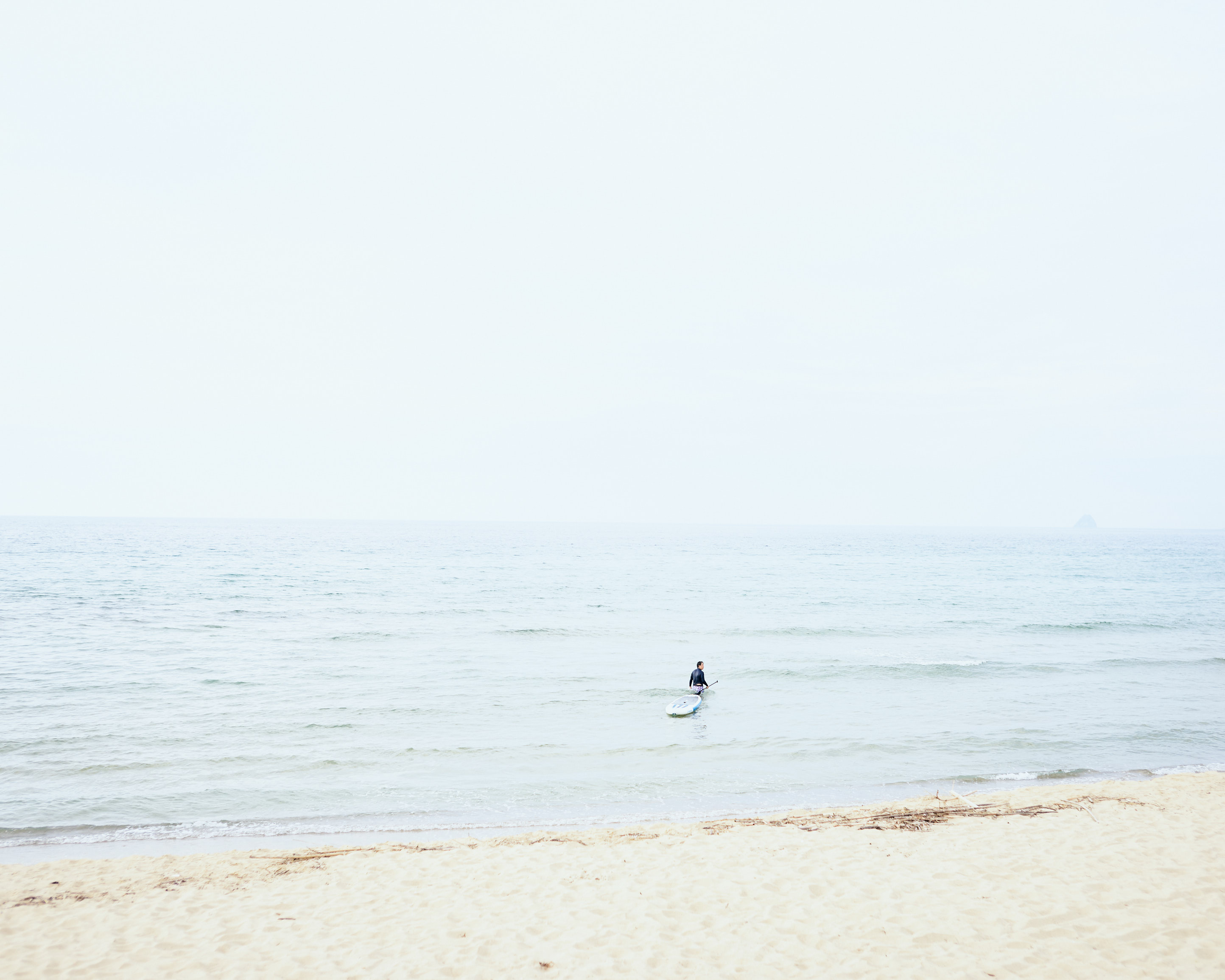itoshima beach surfer summer calm