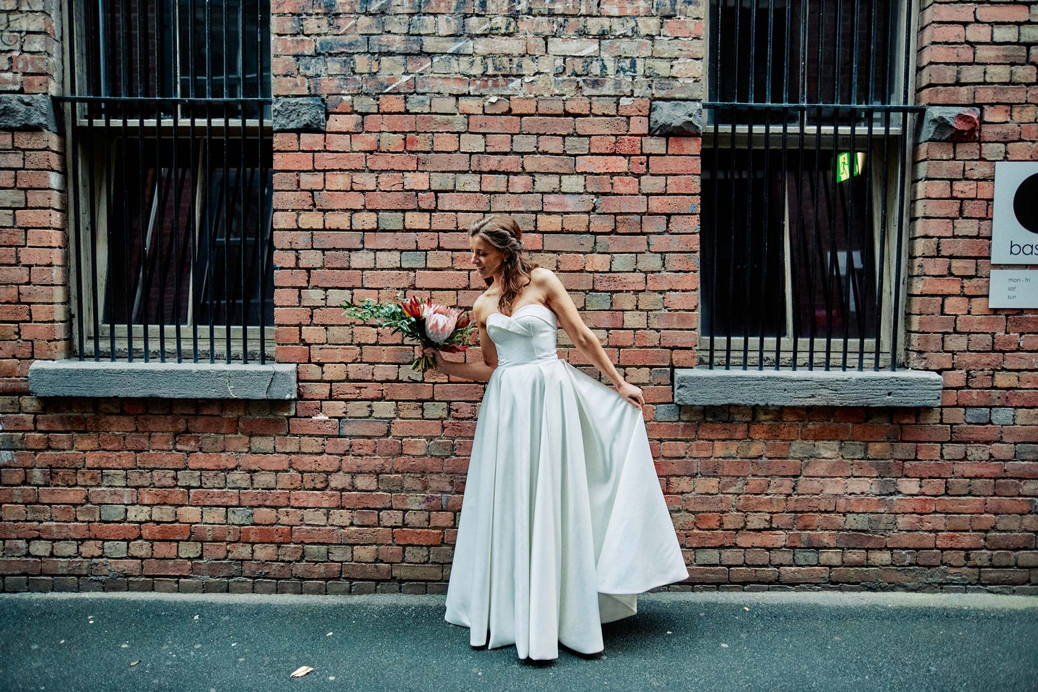 Melbourne Wedding Hardware Lane alley portrait bride holding bouquet in alleyway
