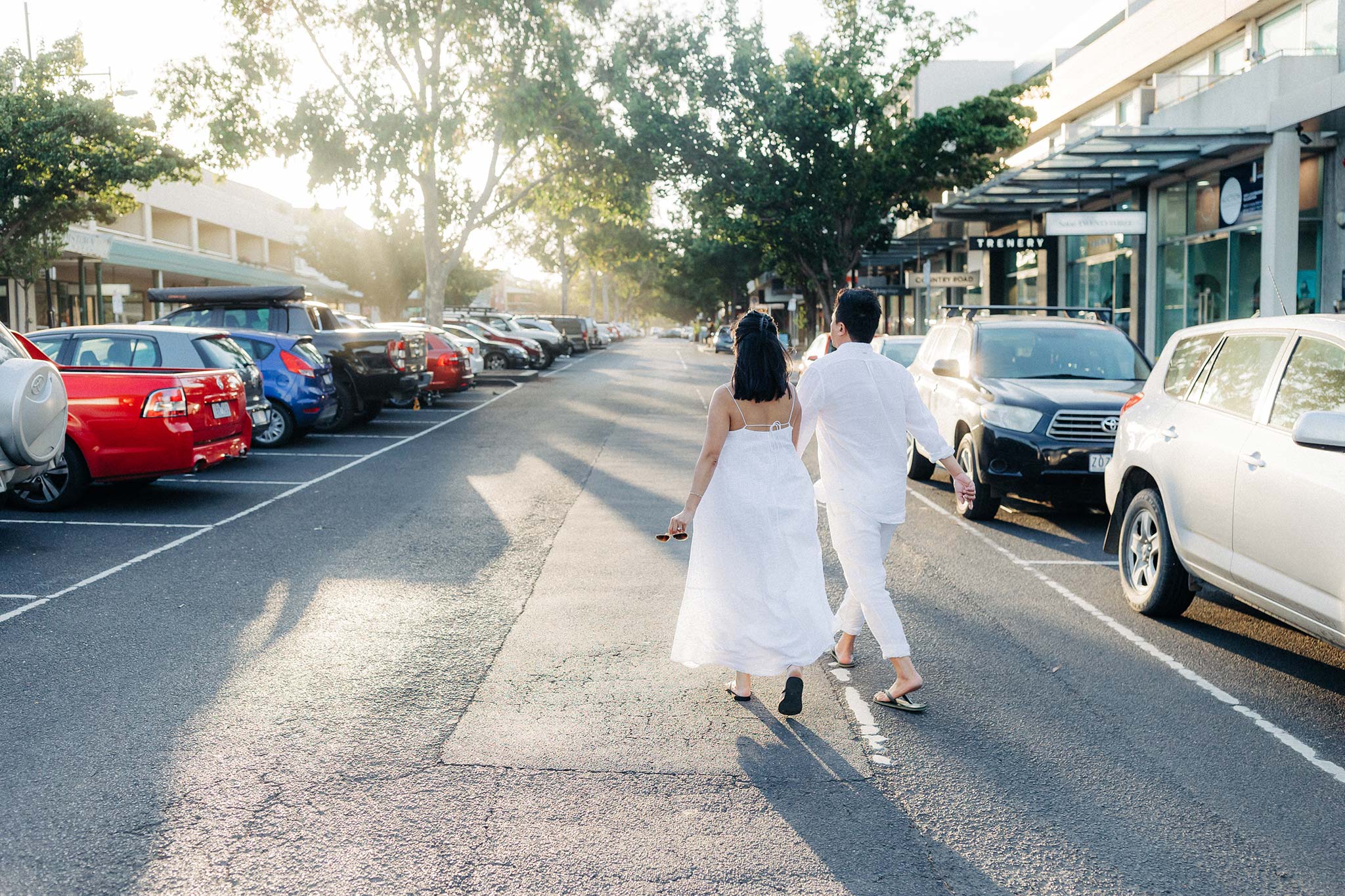 Melbourne Williamstown Pre Wedding Engagement road crossing against the sun