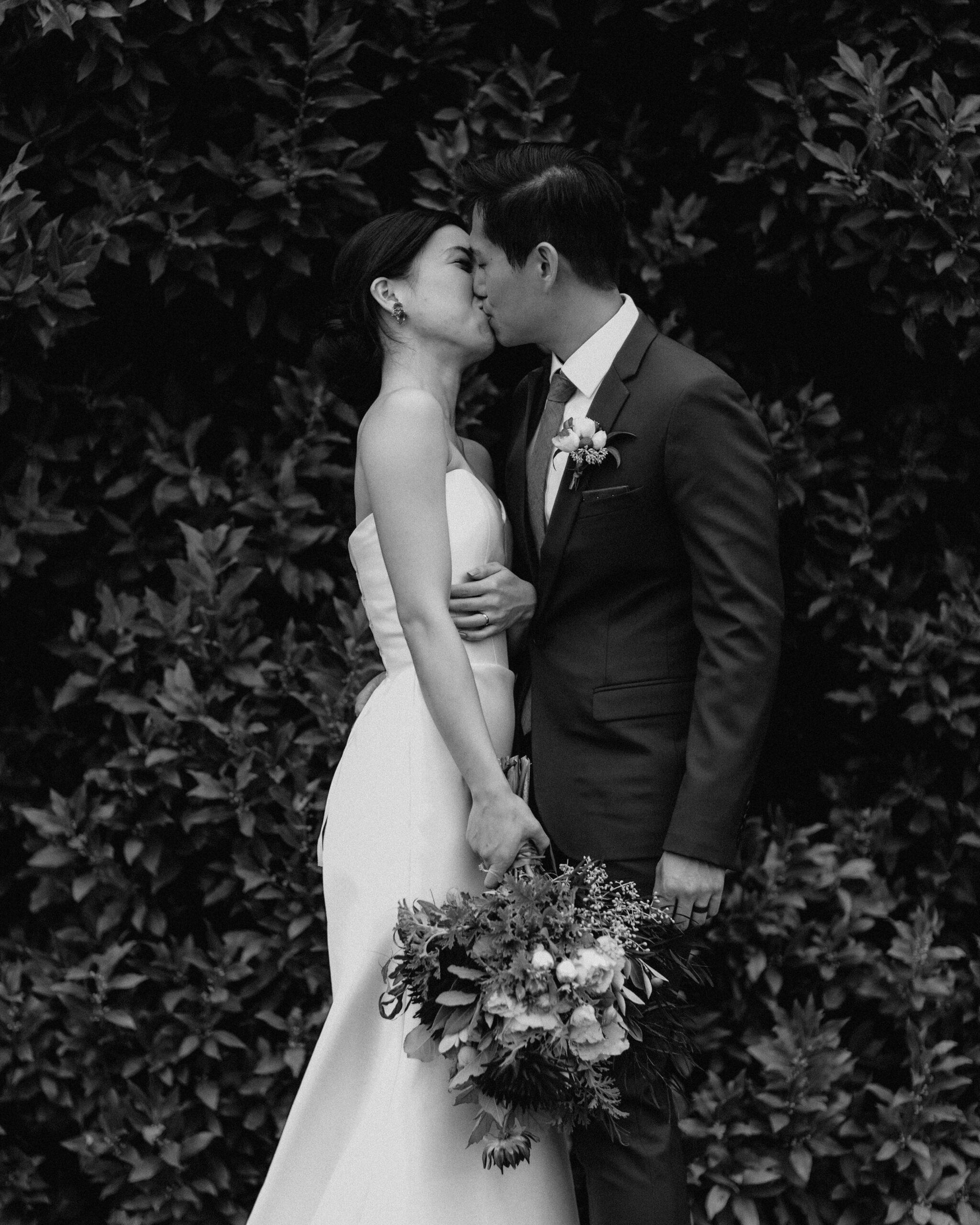 bride and groom kissing stones of yarra valley wedding embrace